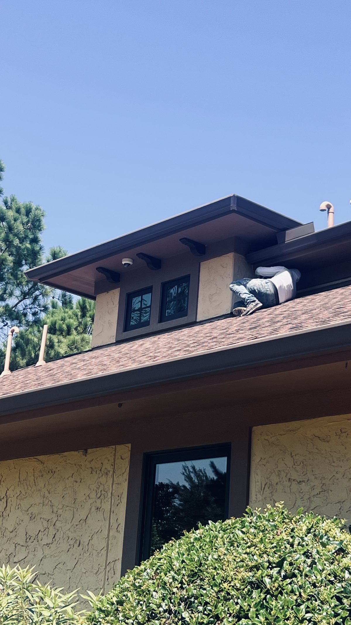 Stucco and trim repaint on a tile-roof home
