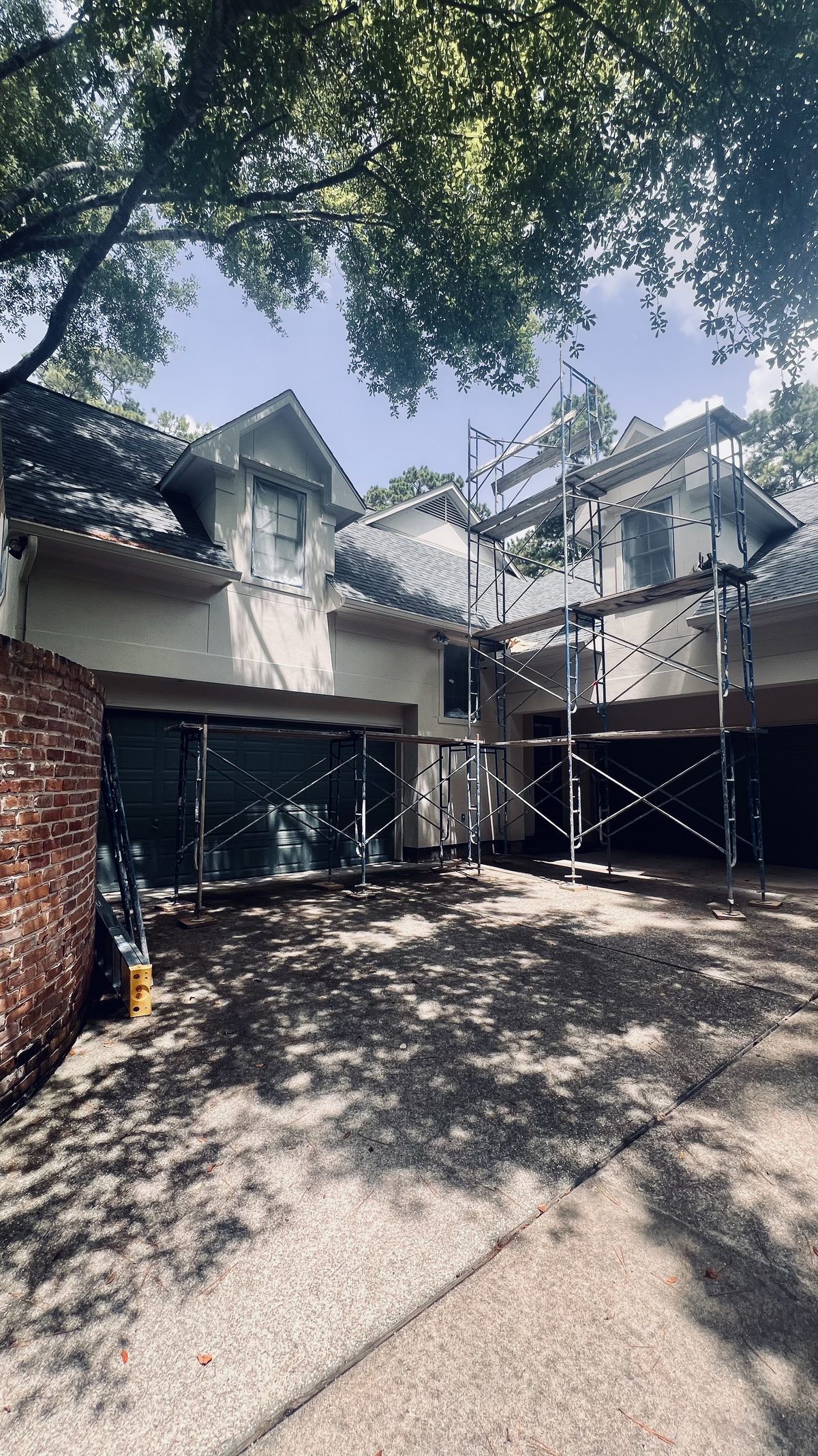 Brick and stucco townhome exterior repaint
